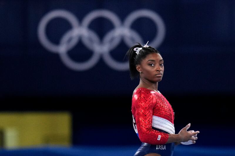 U.S. superstar gymnast Simone Biles waits to perform on the vault during the artistic gymnastics women’s final at the 2020 Summer Olympics.
