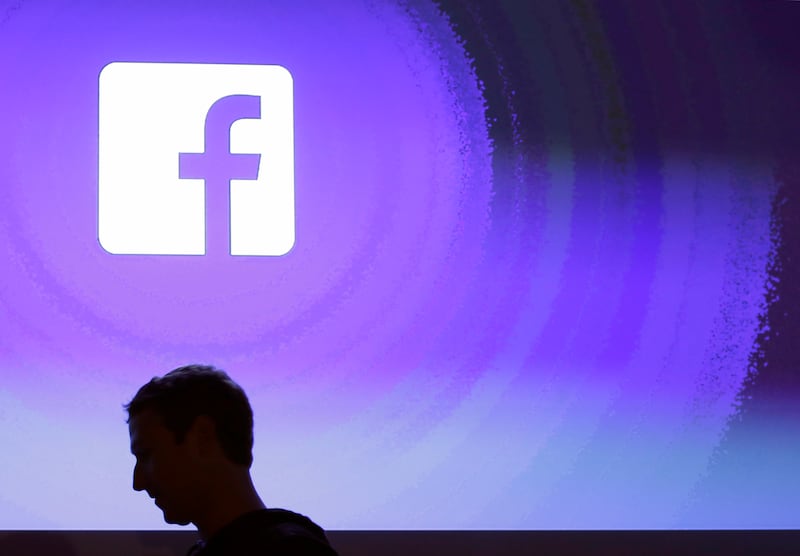 In this April 4, 2013 file photo, Facebook CEO Mark Zuckerberg walks at the company's headquarters in Menlo Park, Calif. Facebook announced on Wednesday, March 27, 2019, that it is broadening its definition of hate speech to apply to "white nationalists"