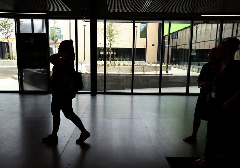 Volunteers of America employees wait for clients to arrive for tours at the Geraldine E. King Women's Resource Center in Salt Lake City on Friday, July 26, 2019.