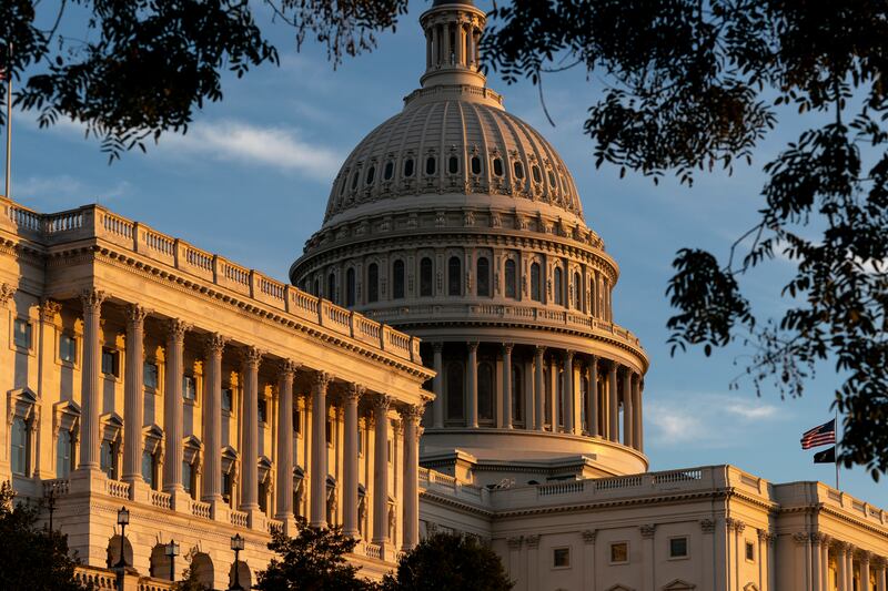 The sun sets at the the Capitol in Washington.