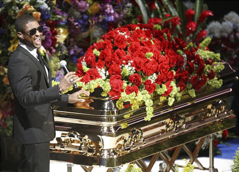 Usher performs at the Michael Jackson public memorial service held at Staples Center on Tuesday in Los Angeles. Jackson, an iconic pop star, died at the age of 50 at UCLA Medical Center after going into cardiac arrest at his rented home on June 25 in Los