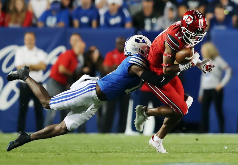 Utes wide receiver Devaughn Vele makes a catch during a game against BYU at LaVell Edwards Stadium in Provo, Sept. 11, 2021.
