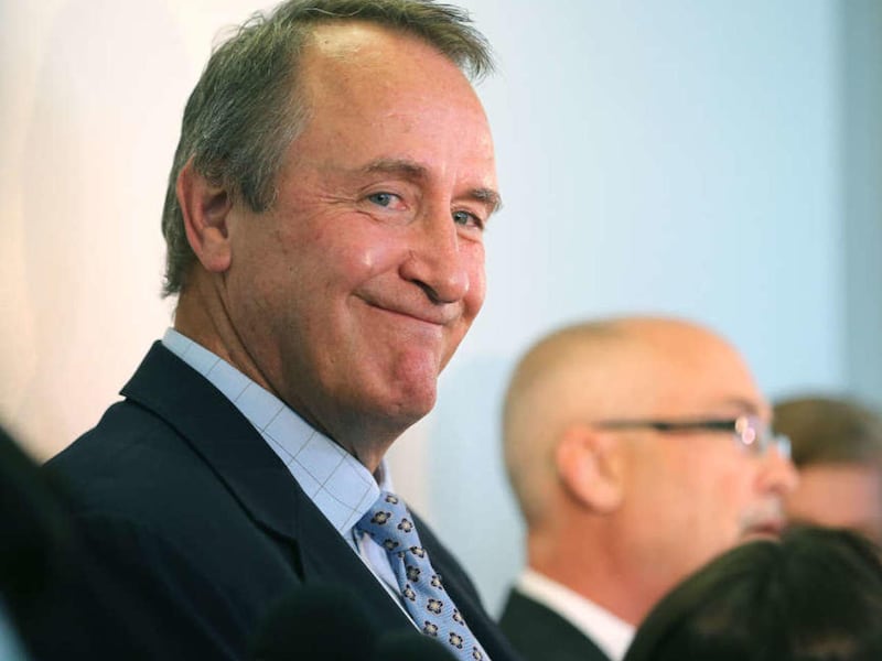 Former Utah Attorney General Mark Shurtleff gives a grin after he appeared in court with his attorney Richard Van Wagoner at the Matheson Courthouse in Salt Lake City Monday, June 15, 2015, with his daughter Annie. Attorney Richard Van Wagoner.