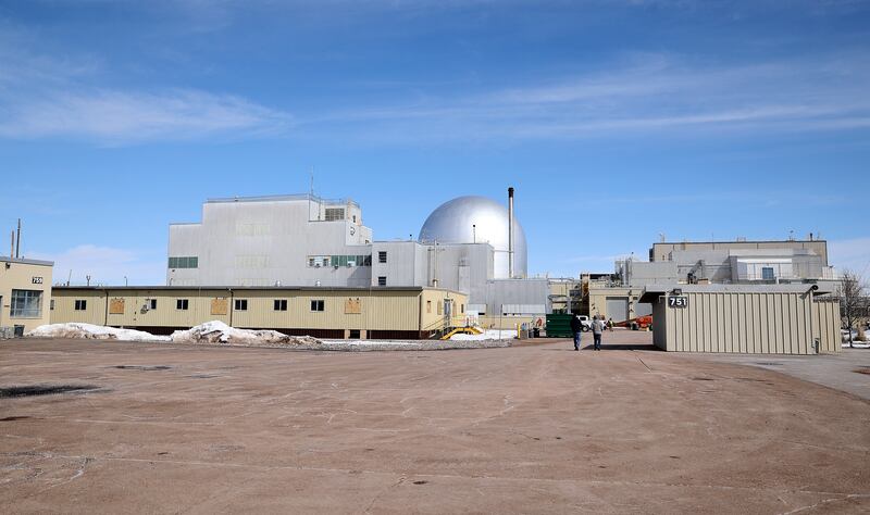 People walk through the Idaho National Laboratory campus in a remote area west of Idaho Falls, Idaho.
