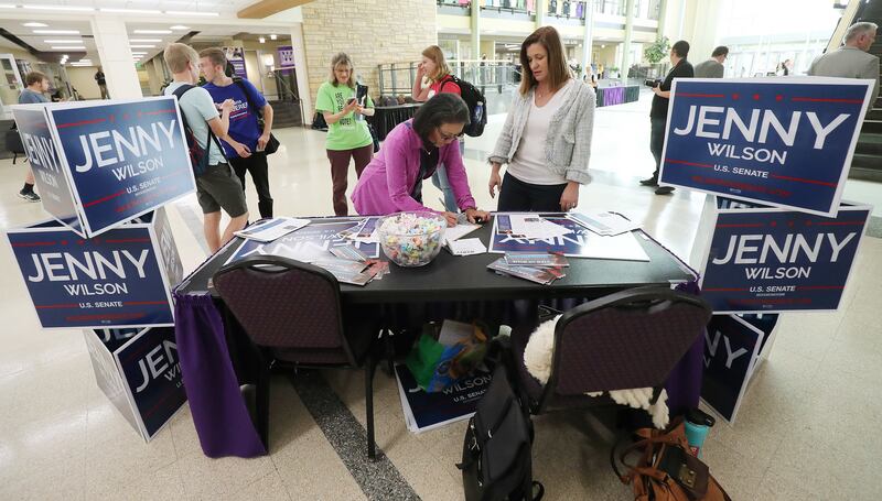 U.S. Senate candidate Jenny Wilson talks with Yaeko Brynner at Weber State University in Ogden on Wednesday, Oct. 3, 2018.