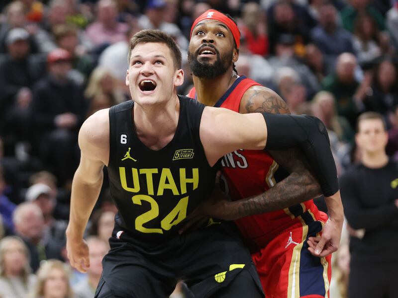 Utah Jazz center Walker Kessler battles for position with New Orleans forward Naji Marshall in Salt Lake City, Dec. 13, 2022.