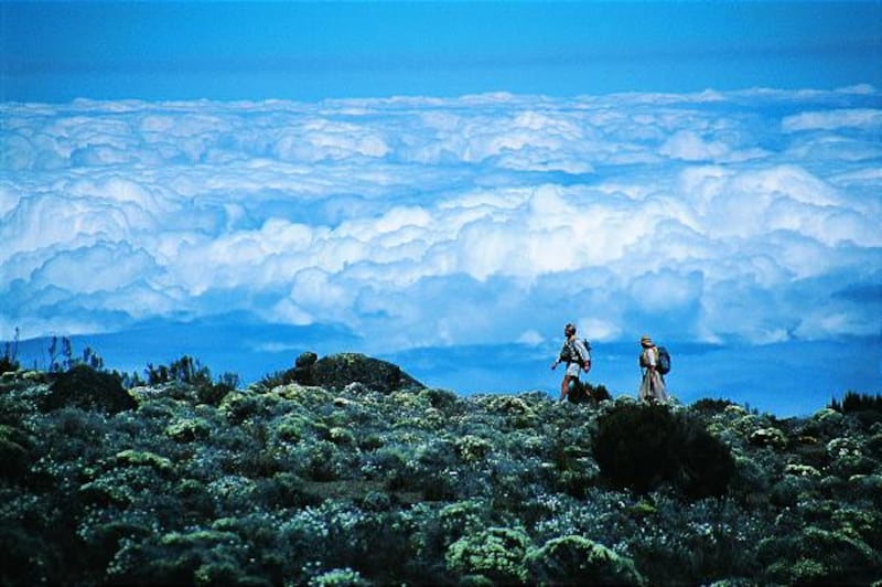 Alexandre and Sonia Poussin cross the Shira plateau \— part of their three-year, 8,700-mile trek across the African continent.