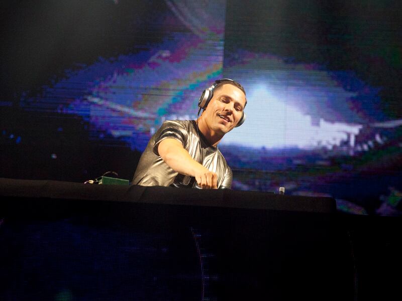 In this Oct. 3, 2014 file photo, DJ Tiesto performs during a concert at the Presidente Festival at the Olympic Stadium in Santo Domingo, Dominican Republic.