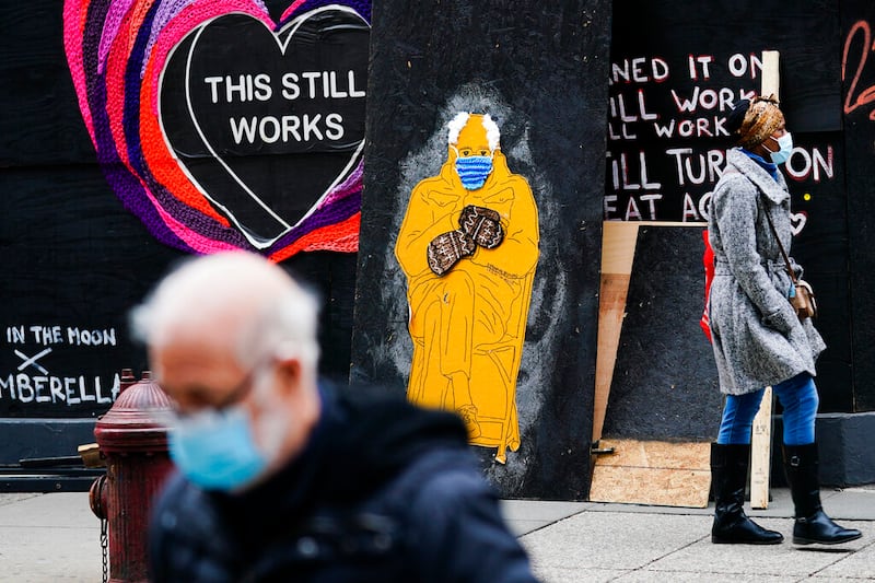 People in face masks as a way to stop COVID-19.