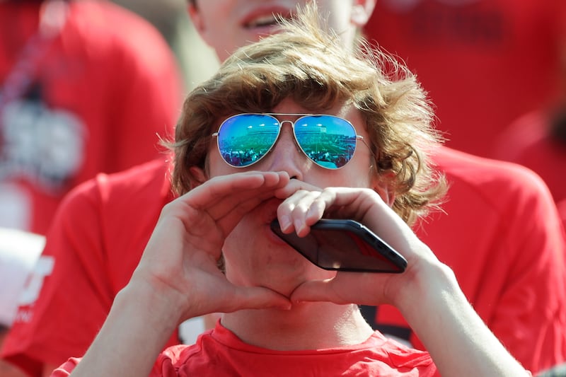 A fan in the Utah Utes student section boos the officials during a game against the SUU Thunderbirds in Salt Lake City.