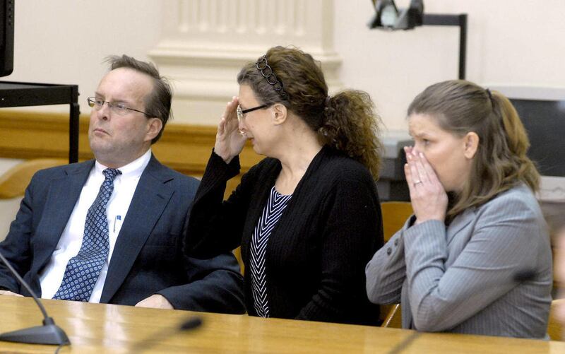 Tracey Richter, center, reacts as the jury in her first-degree murder trial returns a guilty verdict Monday, Nov. 7, 2011 in Webster County District Court. Richter was convicted for the Dec. 13, 2001 shooting death of Dustin Wehde in her Early, Iowa home.