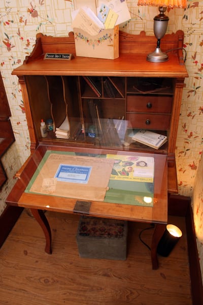 The writing desk where Laura Ingalls Wilder penned many of the books in her "Little House" novels remains in her former home near Mansfield, Mo., Feb. 21, 2007.