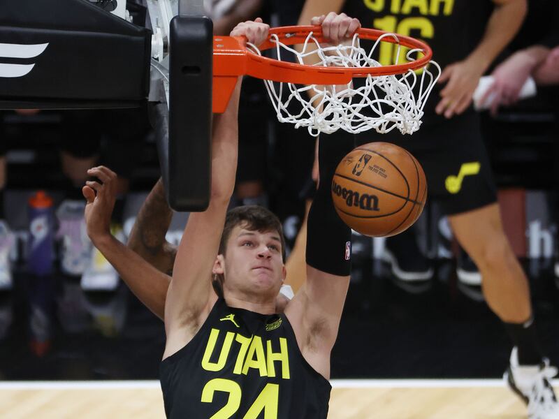 Utah Jazz center Walker Kessler (24) dunks in Salt Lake City on Tuesday, Nov. 15, 2022. The Knicks won 113-104.