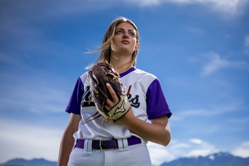 Riverton’s Kaysen Korth, wearing white, poses for a photo a