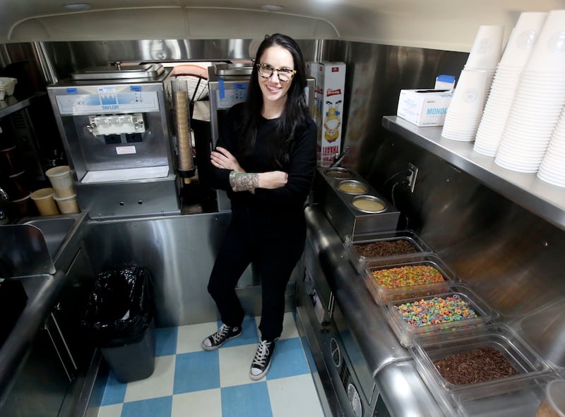 Alexa Norlin, owner of Normal Ice Cream, poses for a photo by the Normal Ice Cream truck in Trolley Square in Salt Lake City on Wednesday, Feb. 20, 2019.