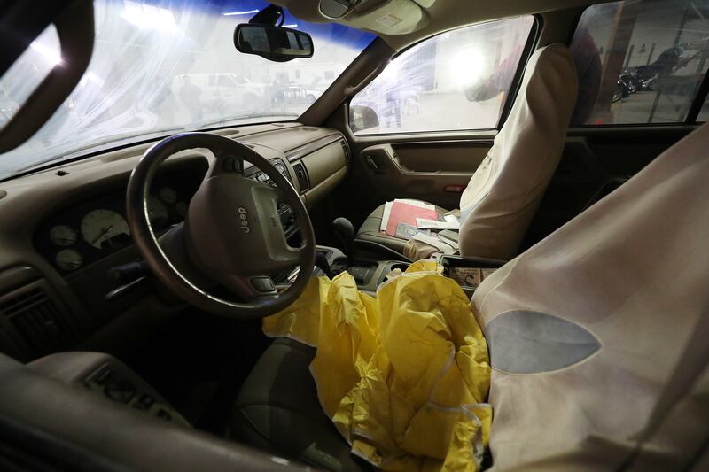 The interior of a Jeep Cherokee belonging to shooting victim Cesar Ramirez is pictured in a storage warehouse at the Freeport Center in Clearfield on Tuesday, Feb. 5, 2019. Ten years ago this week, Ramirez, 18, was driving the Jeep on I-15 in Salt Lake C
