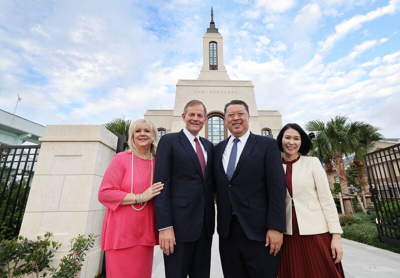Elder Gary E. Stevenson, Sister Lesa Stevenson, Elder Takashi Wada and Sister Naomi Wada pose at the Okinawa Japan Temple.