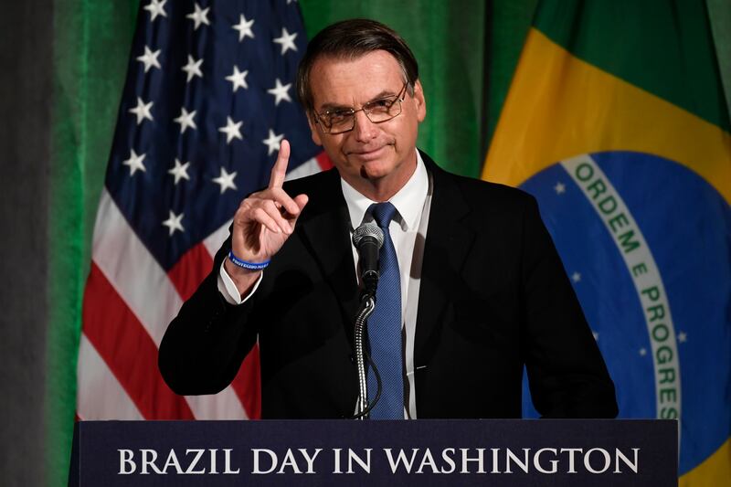 Brazilian President Jair Bolsonaro speaks at the Chamber of Commerce in Washington.