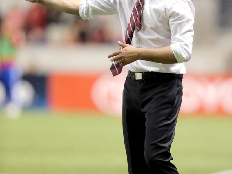 Real Salt Lake head coach Mike Petke talks to his players as Real Salt Lake is losing to FC Dallas in a soccer game at Rio Tinto Stadium in Sandy on Saturday, May 6, 2017. Real Salt Lake lost 0-2.