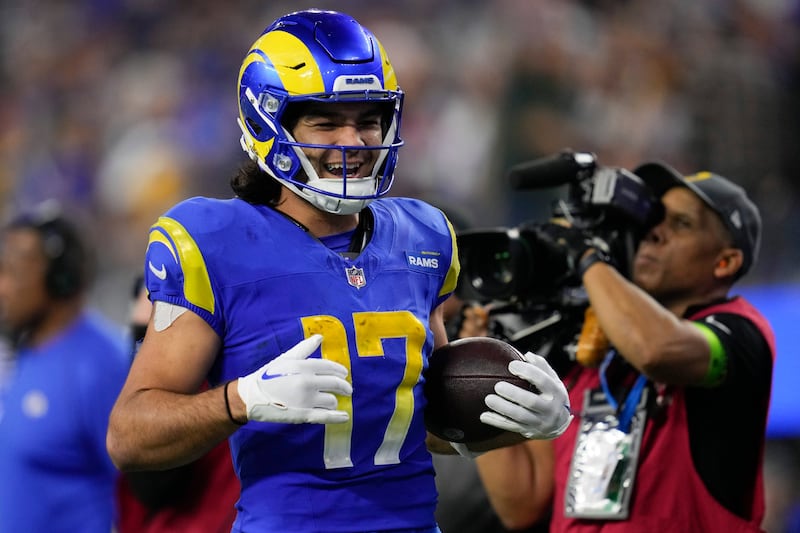 Los Angeles Rams receiver Puka Nacua smiles after a reception during a game against the New Orleans Saints.