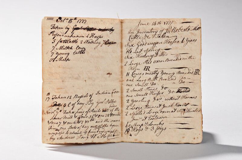 This photo provided by Skinner, Inc., shows a Revolutionary War-era ledger of wealthy Pennsylvania businessman John Roberts III that will be auctioned. In November 1778, Roberts and a fellow Quaker were convicted of treason against the American cause and