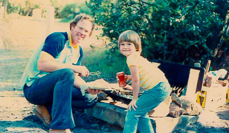 Utah head women's basketball coach Lynne Roberts, 1982, enjoying a camping trip with her father, Don Roberts.