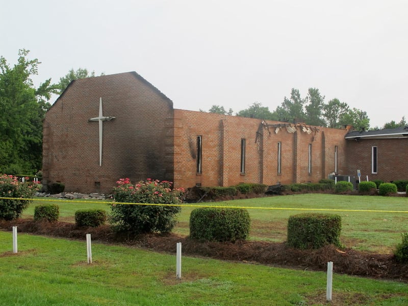 The Mount Zion AME Church in Greeleyville, S.C., is seen on Wednesday, July 1, 2015, after it was heavily damaged by fire. The church was the target of arson by the Ku Klux Klan two decades ago but a law enforcement source told The Associated Press that t