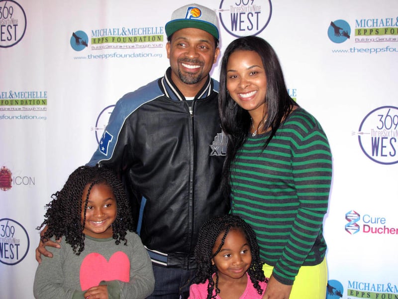 Actor-comedian Mike Epps poses with his family, wife Mechelle, and daughters Mariah, left, and Maddie at an event launching the Michael and Mechelle Epps Foundation, Friday, Feb. 3, 2012 in Epps hometown of Indianapolis. The foundation is aimed at promo