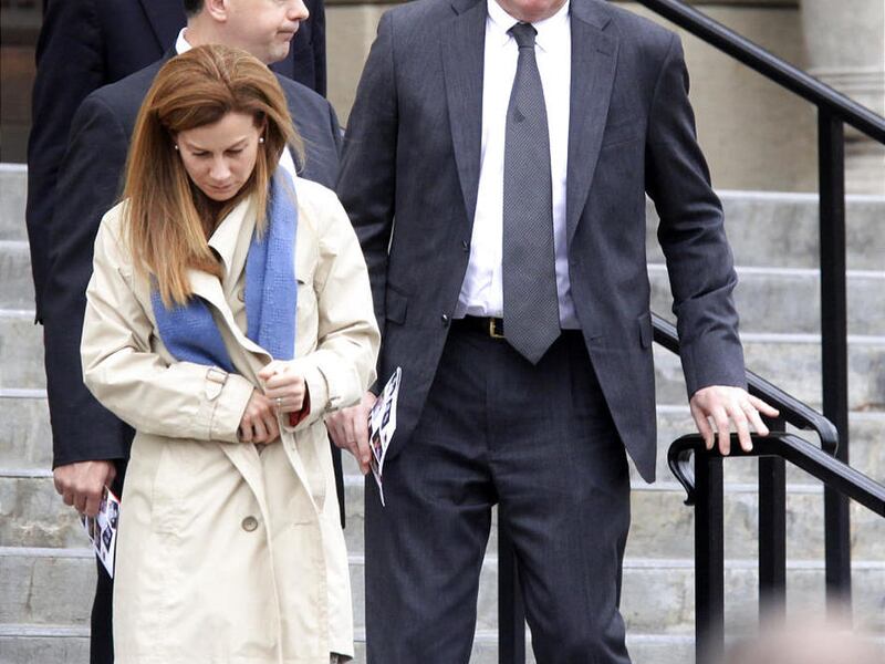 Mark Durcan, right, leaves the Boise funeral service for Micron Technology Inc. CEO Steve Appleton in February.