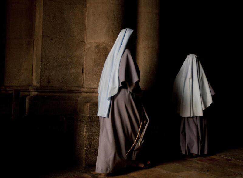 Nuns walk during the Sunday Easter mass at the Church of the Holy Sepulcher, traditionally believed to be the site of the crucifixion of Christ, in Jerusalem's Old City in 2013.