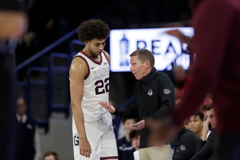 Gonzaga coach Mark Few, right, speaks with Anton Watson during game against Montana, Dec. 20, 2022, in Spokane, Wash.