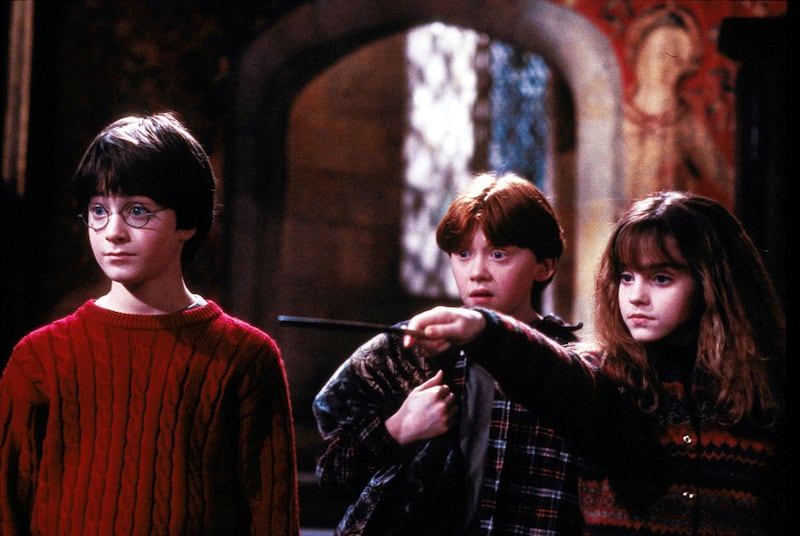Harry Potter (Daniel Radcliffe), Ron Weasley (Rupert Grint) and Hermione Grainger (Emma Watson) in “Harry Potter and the Sorcerer’s Stone.”