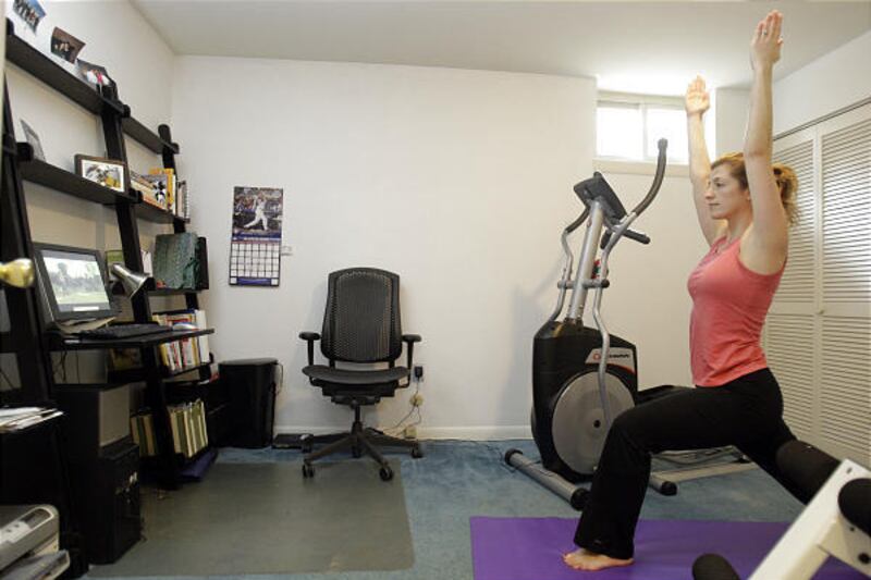 Yogo enthusiast Jessica Sharp of Philadelphia works out with www.yogatoday.com.