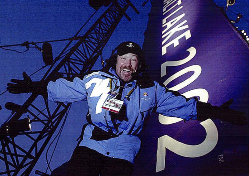 Tim Hughes, medal announcer at the 2002 Winter Games, announces for the Denver Nuggets during the playoffs.