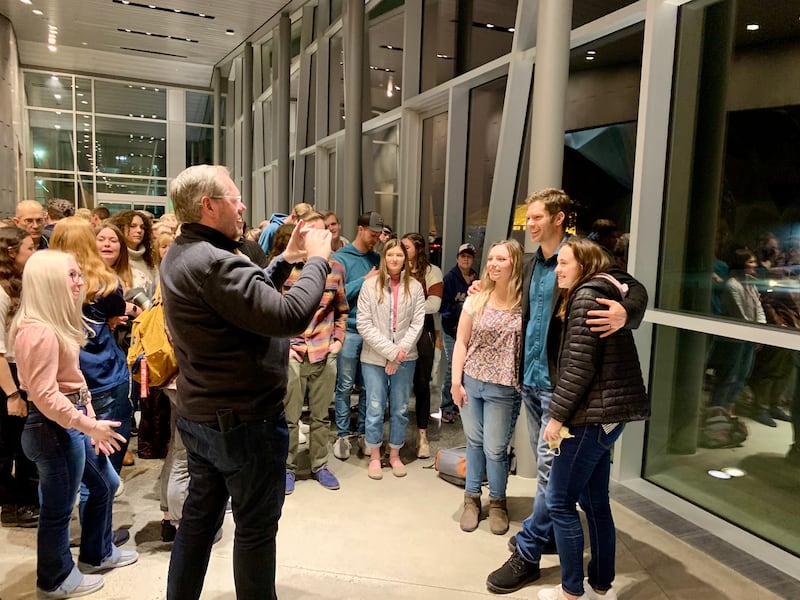Dallas Jenkins, creator of “The Chosen” series, takes a photo with fans after an event at Utah State University.