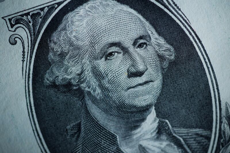 The likeness of George Washington is seen on a U.S. $1 bill, Monday, March 13, 2023, in Marple Township, Pa.
