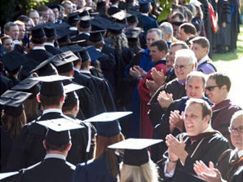 BYU-Idaho students are applauded during their graduation ceremony. Elder Richard Hinckley was the keynote speaker.