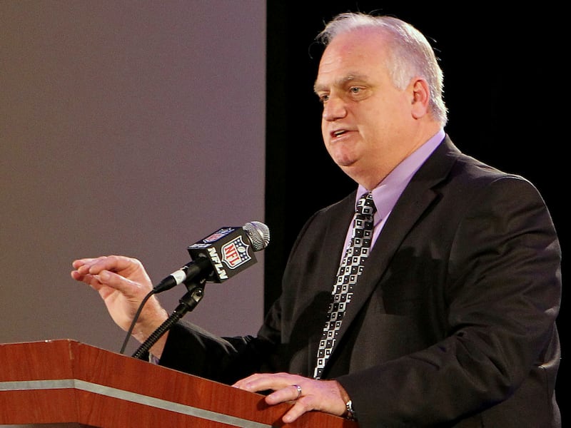 FILE - In this Jan. 31, 2013, file photo, former NFL quarterback Eric Hipple speaks during an NFL Player Health and Safety press conference in New Orleans. Forty years since he graduated as arguably Utah State University's best quarterback, Hipple returns