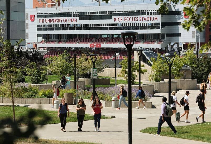 Students walk on the University of Utah campus in Salt Lake City.
