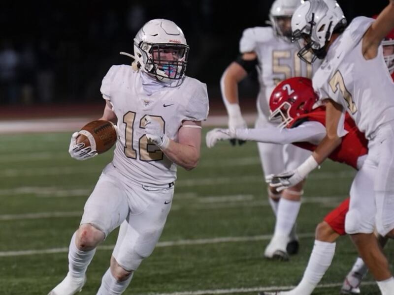 Desert Hills’ Tyden Morris runs