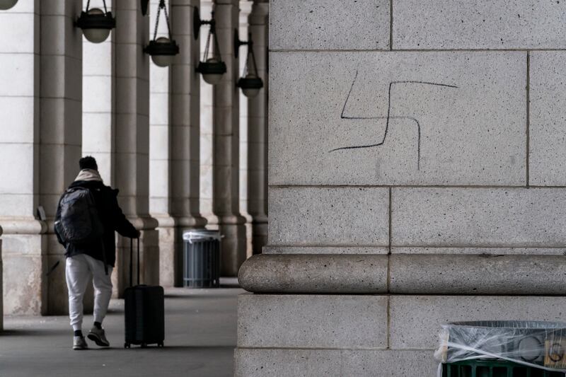 A hand-drawn swastika is seen on the front of Union Station in Washington, Jan. 28, 2022.