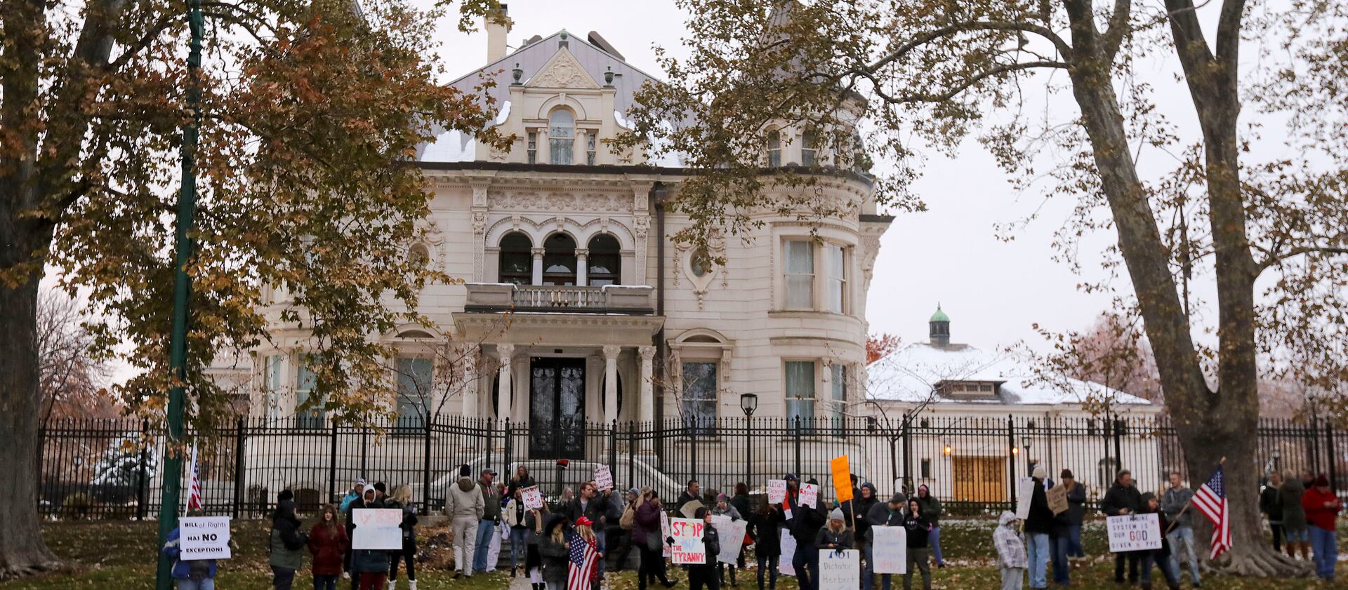Protesters gather outside the Governor’s Mansion in Salt Lake City.