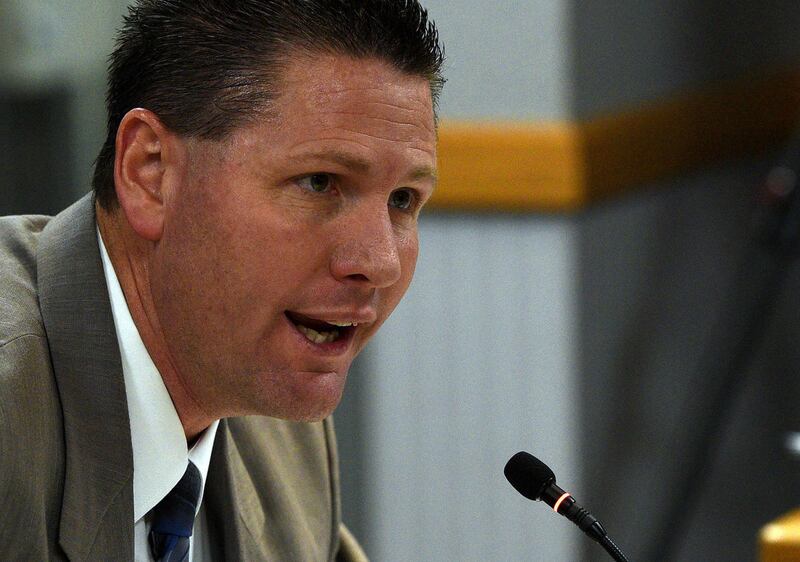 FILE: Rob Cuff, executive director of the Utah High School Activities Association, answers a question during an Utah State Board of Education meeting in Salt Lake City on Friday, Sept. 9, 2016.