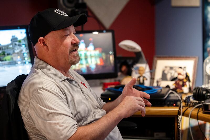 Radio personality Tim Hughes sits in his home studio during an interview with Lee Benson in West Jordan on Tuesday, Oct. 26, 2021.