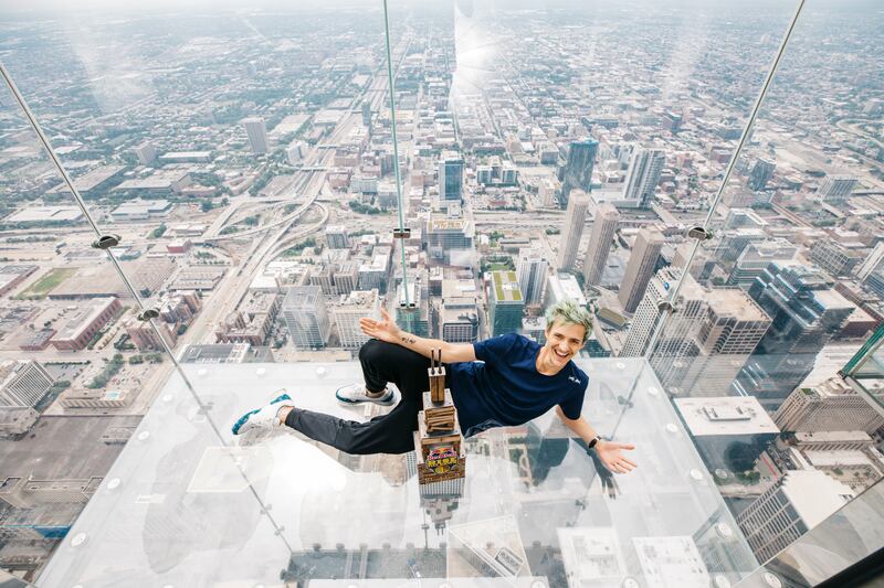Legendary esports star Tyler "Ninja" Blevins faced two hundred Fortnite players in an epic battle from sunset to sunrise in Red Bull Rise Till Dawn. He partnered with friend DrLupo against one hundred other teams of two inside the 99th floor of Chicago's