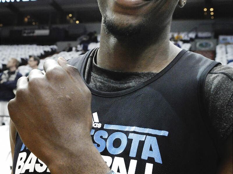 Minnesota's Anthony Tolliver displays his Active Faith wristband, a product his company launched this year.