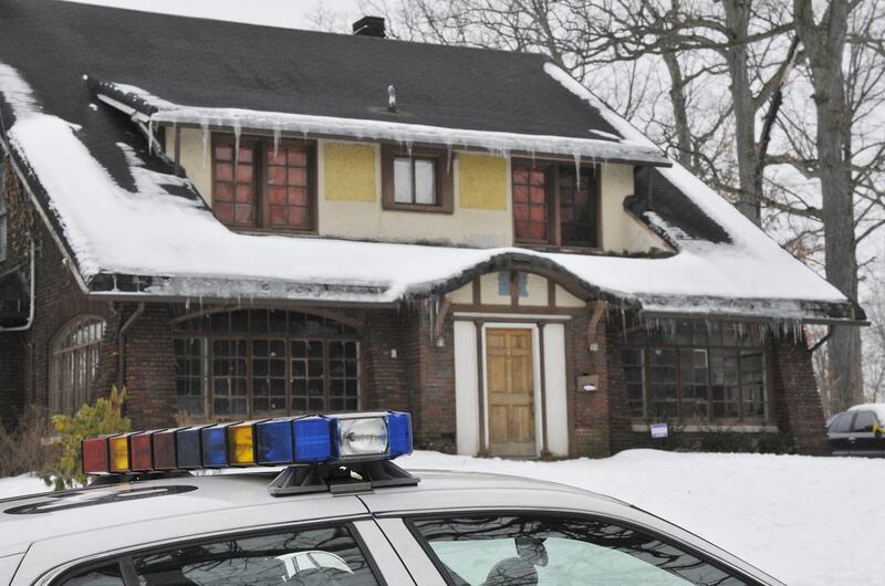 A Youngstown State Police University officer patrols the street near the location of an early morning shooting at a fraternity house just north of the Youngstown State University campus that left student Jamail E. Johnson, 25 of Youngstown dead and 11 inj