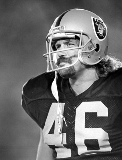 This Aug. 15, 1987, photo provided by the NFL shows Los Angeles Raiders tight end Todd Christensen (46) during a preseason football game against the San Francisco 49ers. Christensen died on Nov. 13, 2013, at age 57 in Alpine, Utah.