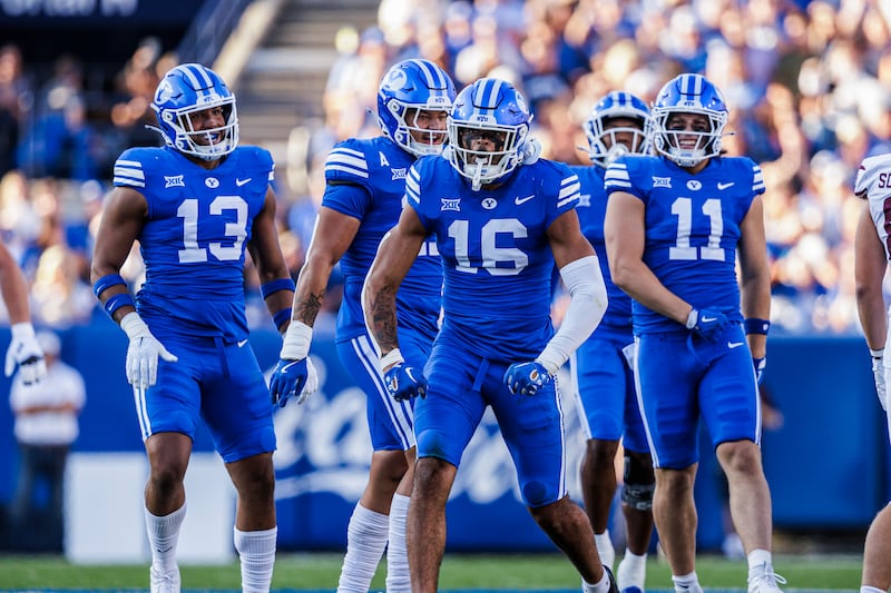 BYU's Isaiah Glasker, 16, reacts after a big play during the Cougars' season-opening win over Southern Illinois at LaVell Edwards Stadium on Saturday, Aug. 31, 2024.