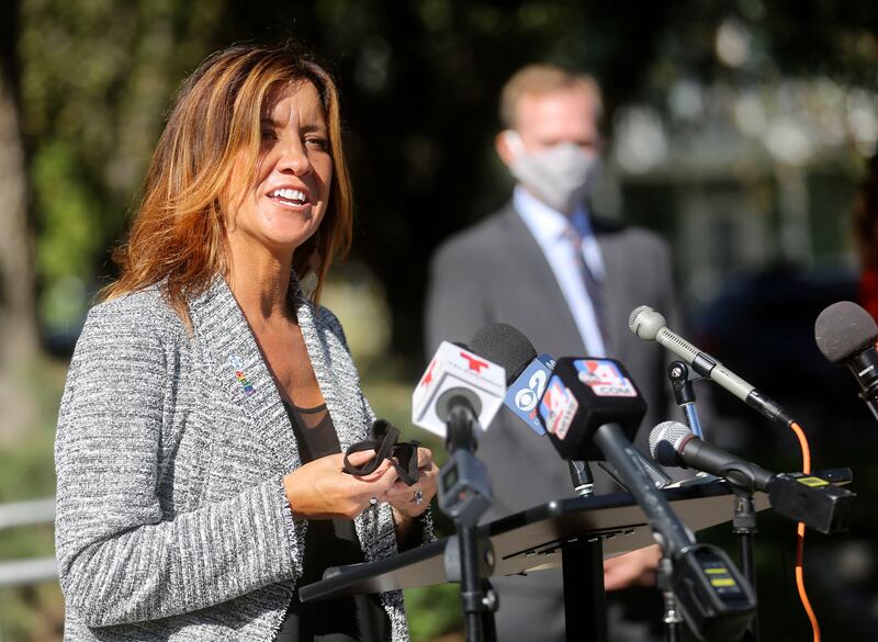 Taryn Hiatt, Utah area director for the American Foundation for Suicide Prevention, speaks during a press conference about the bipartisan Mental Health Professionals Workforce Shortage Loan Repayment Act outside of Utah Partners for Health Midvale Clinic.